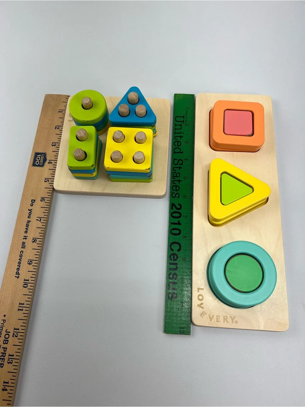 Lovevery Lot of 2 Puzzles Geo Shapes and Sort & Stack Peg Puzzle Montessori Toys